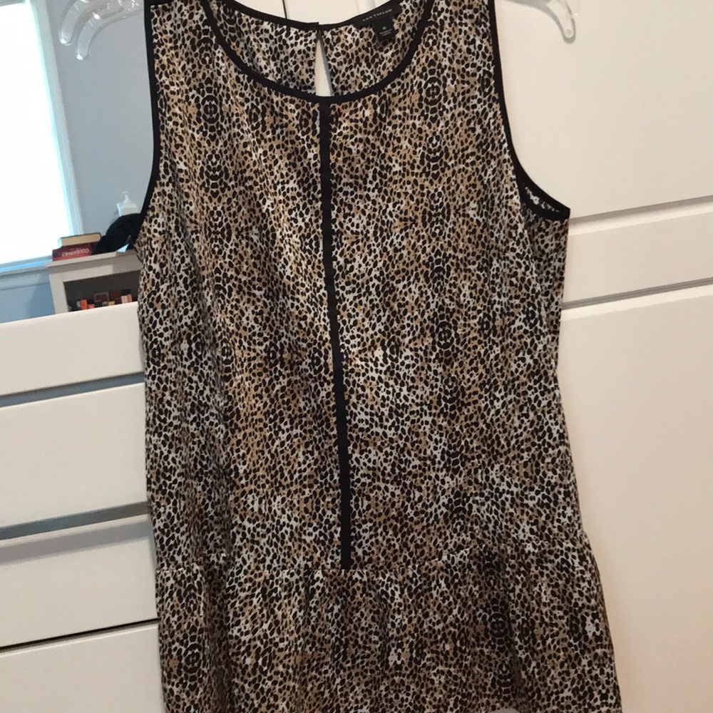 Leopard print sleeveless peplum top